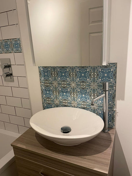 An elegant, restrained bathroom using Suzanne tiles