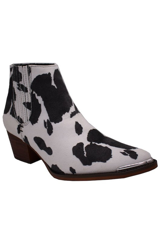 black and white cowhide boots