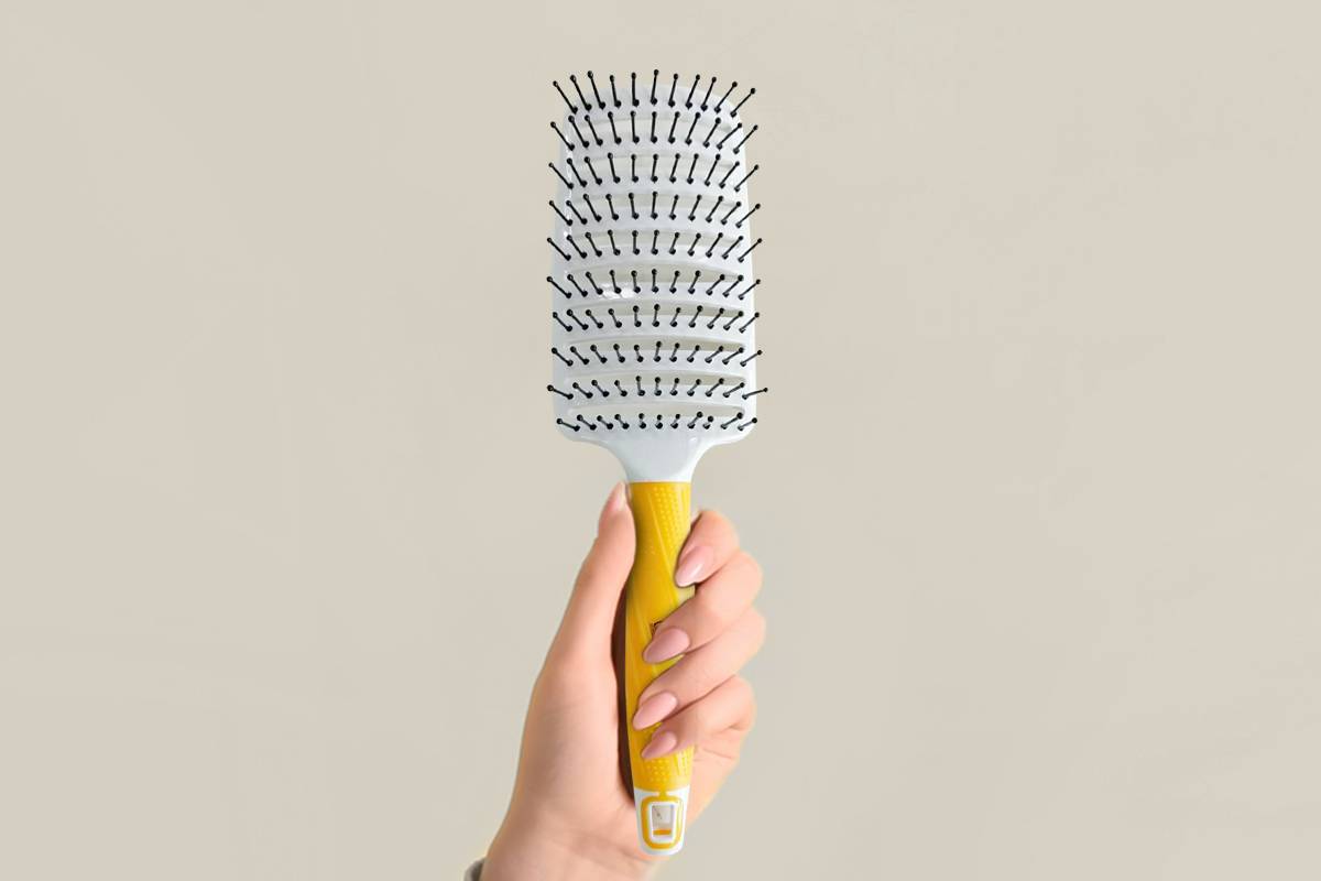cleaning a hairbrush