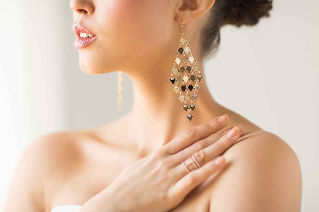 Girl wearing gold earring 