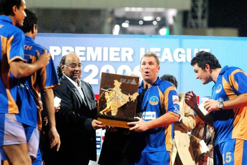 Shane Warne lifting the IPL trophy with Rajasthan Royals after defating Chennai Super Kings in the Finals