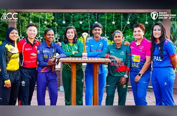 Captains standing around the table with the ACC Emerging Women's Asia Cup trophy