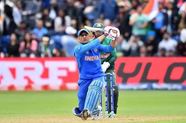 MS Dhoni hits the ball out of the park against Bangladesh in the 2019 ICC Cricket World Cup