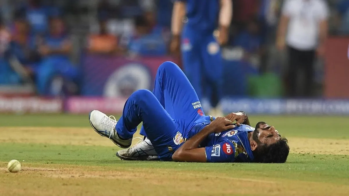 Jasprit Bumrah goes down to the ground with a serious injury