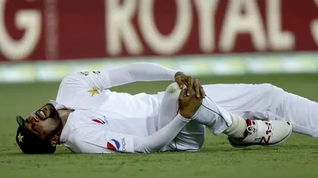 Babar Azam goes down with a knee injury