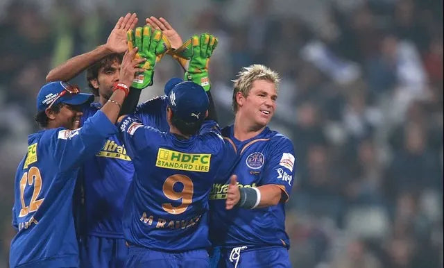 Shane Warne and his Rajasthan Royals CO. Celebrate a victory