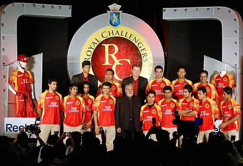 The RCB Players of the 2008 IPL season pose for a photo with the then owner Vijay Mallya in the centre