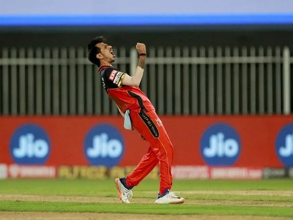 Yuzvendra Chahal celebrates a wicket by roaring up towards the sky