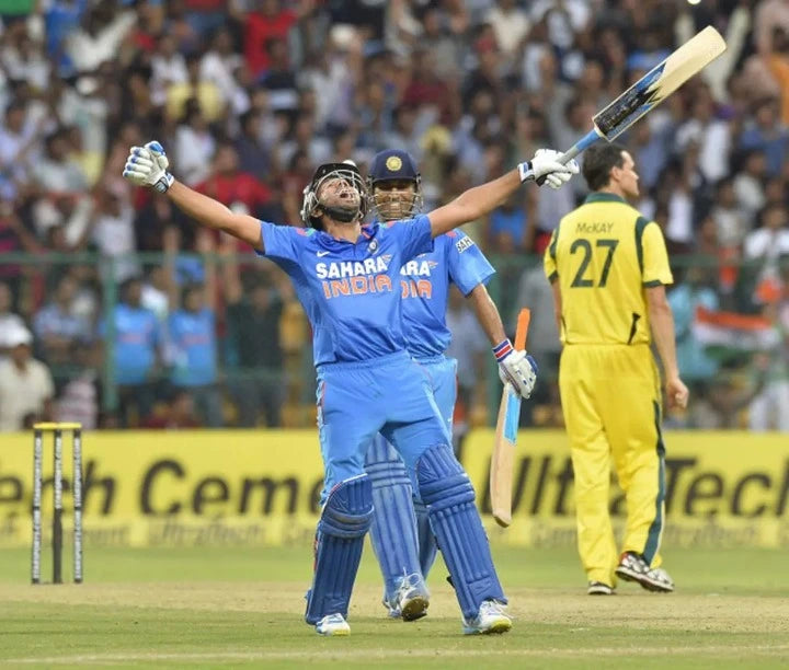 Rohit Sharma celebrates his double century against Australia in an ODI match at the Chinnaswamy Cricket Ground