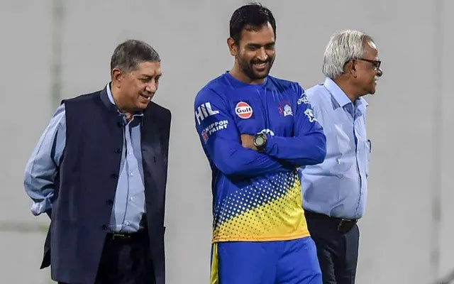 MS Dhoni standing with the past owner of Chennai Super King, N. Srinivasan and the current CEO of CSK, Kasi Viswanathan