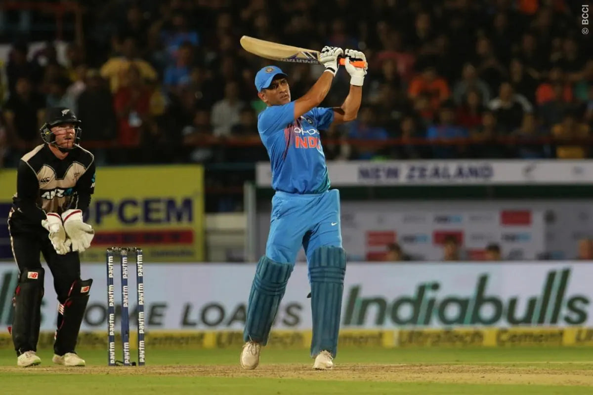 MS Dhoni completes his follow trough after playing the Helicopter Shot