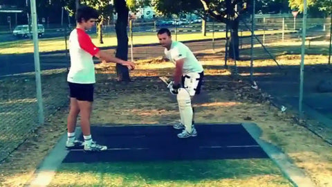 A Cricket Player does the dropball cricket batting drills