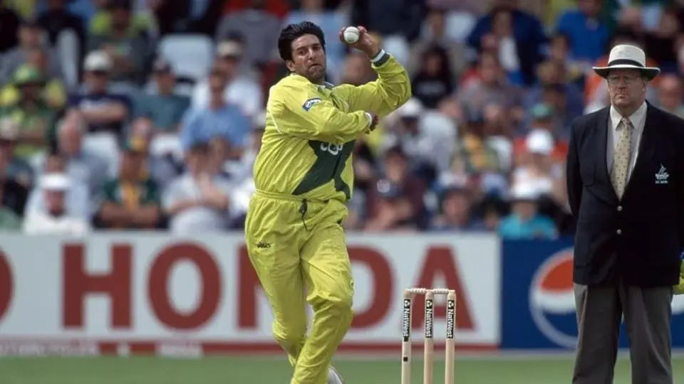Wasim Akram does his bowling action before bowling a reverse swing delivery