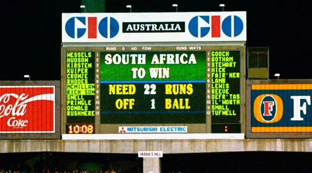A score board displays that South Africa neeeds 22 runs to win in 1 delivery