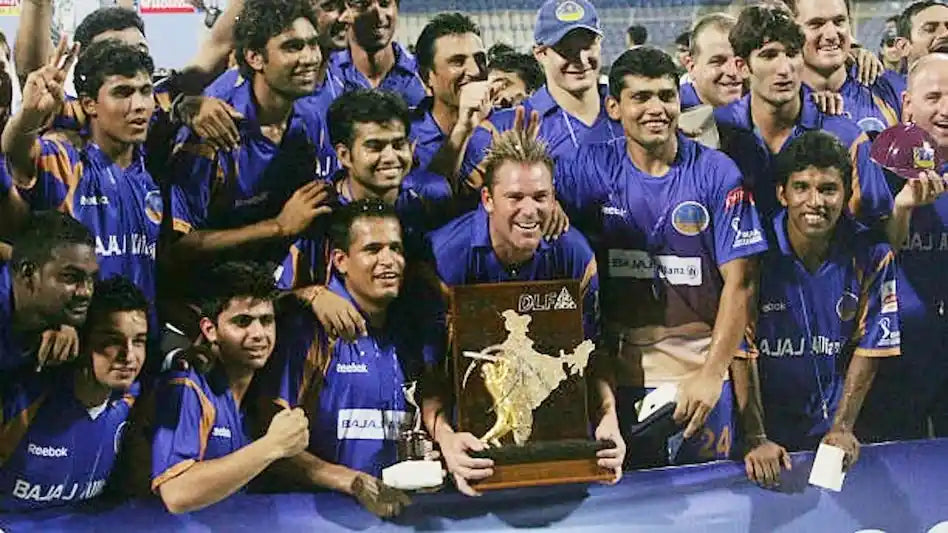 The Rajasthan Royals 2008 IPL Winning Team celebrate with the trophy