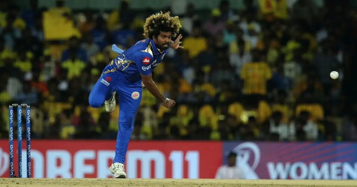 Lasith Malinga bowling with his trademark slinging action in the IPL