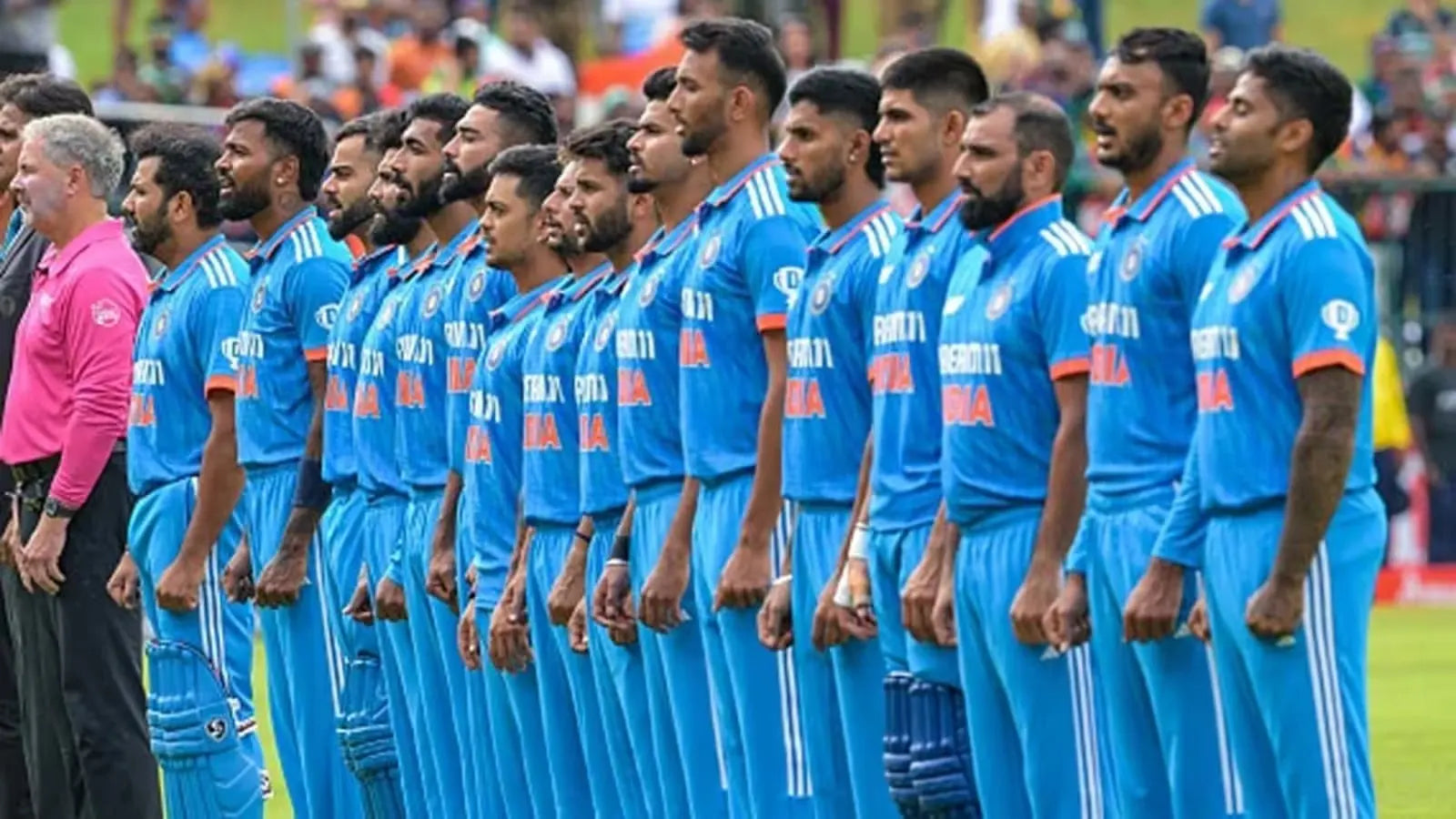 The Indian Cricket Team standing together for the National Anthem before the game