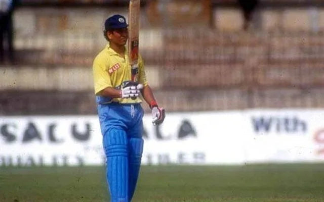 Sachin Tendulkar in the 1992 Indian Cricket Team jersey celebrating a knock