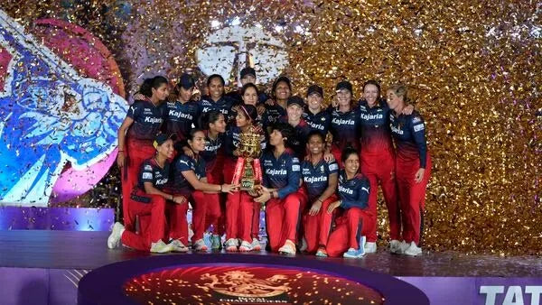 The RCB Women's Team with the WPL Trophy