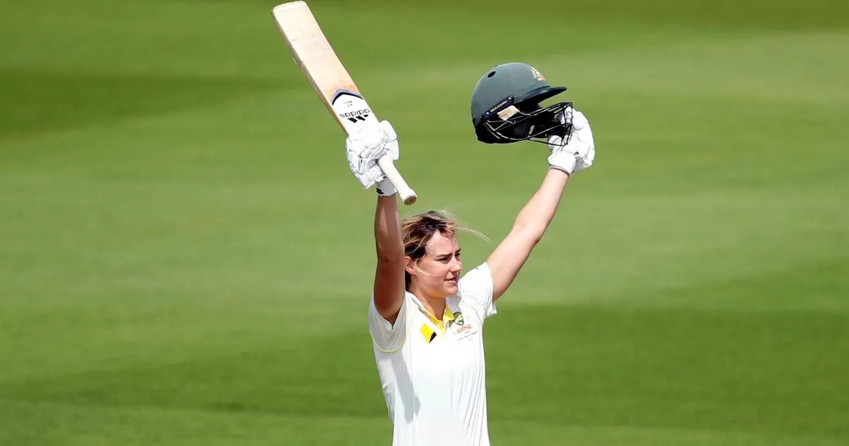 Ellyse Perry celebrates a century by raising her bat