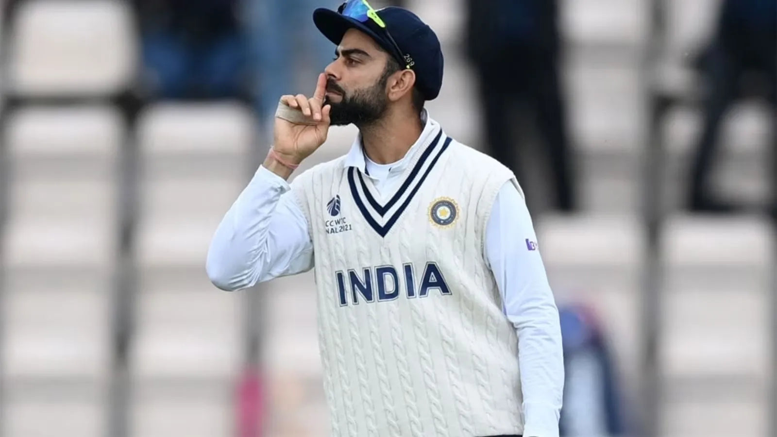Virat Kohli sushing an opponent in a test match as India's Captain