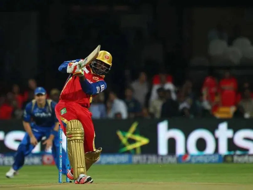 Chris Gayle hits a six against Rajasthan Royals