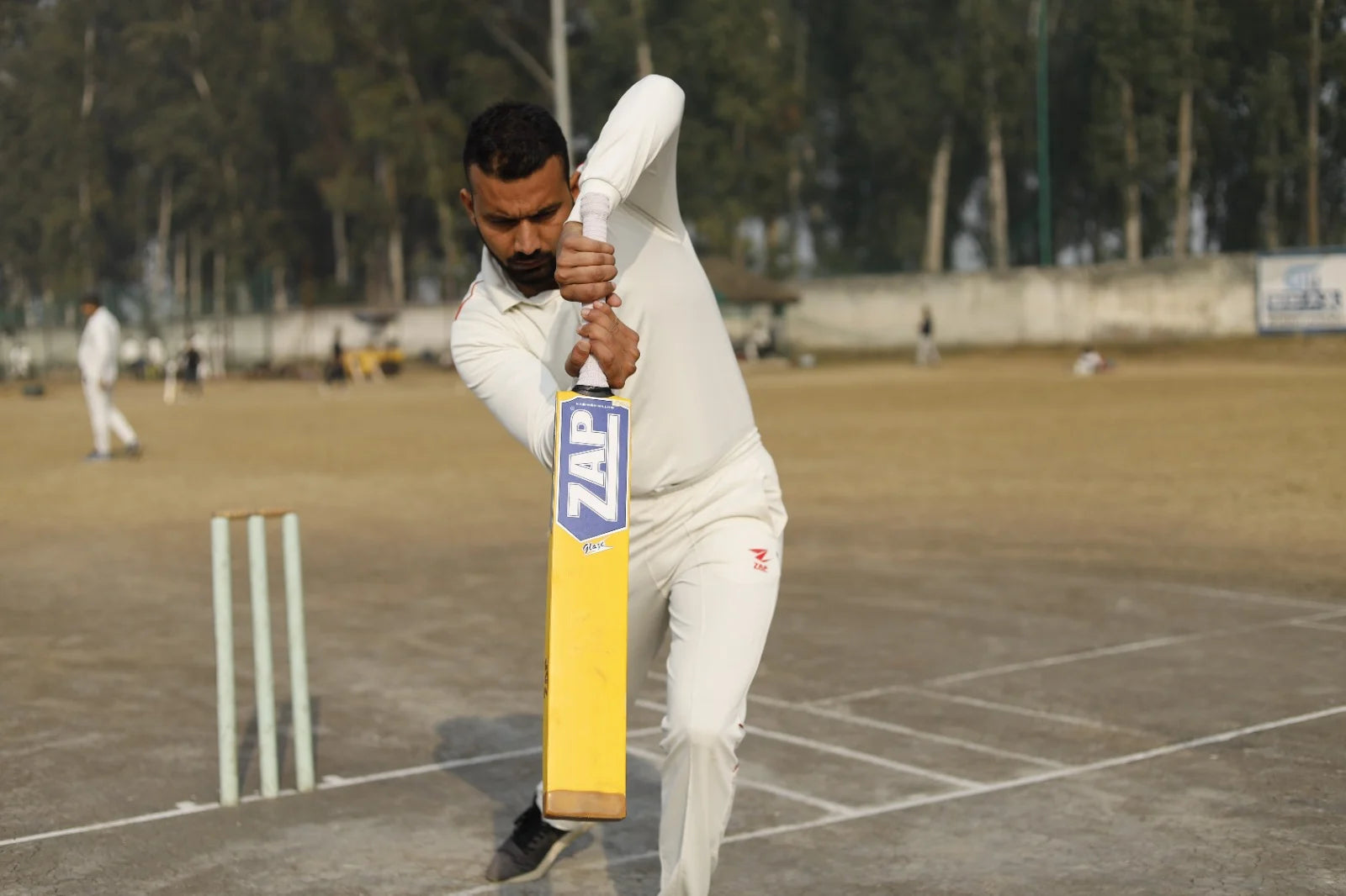 A player doing his shadow batting practice with the ZAP Glaze tennis cricket bat