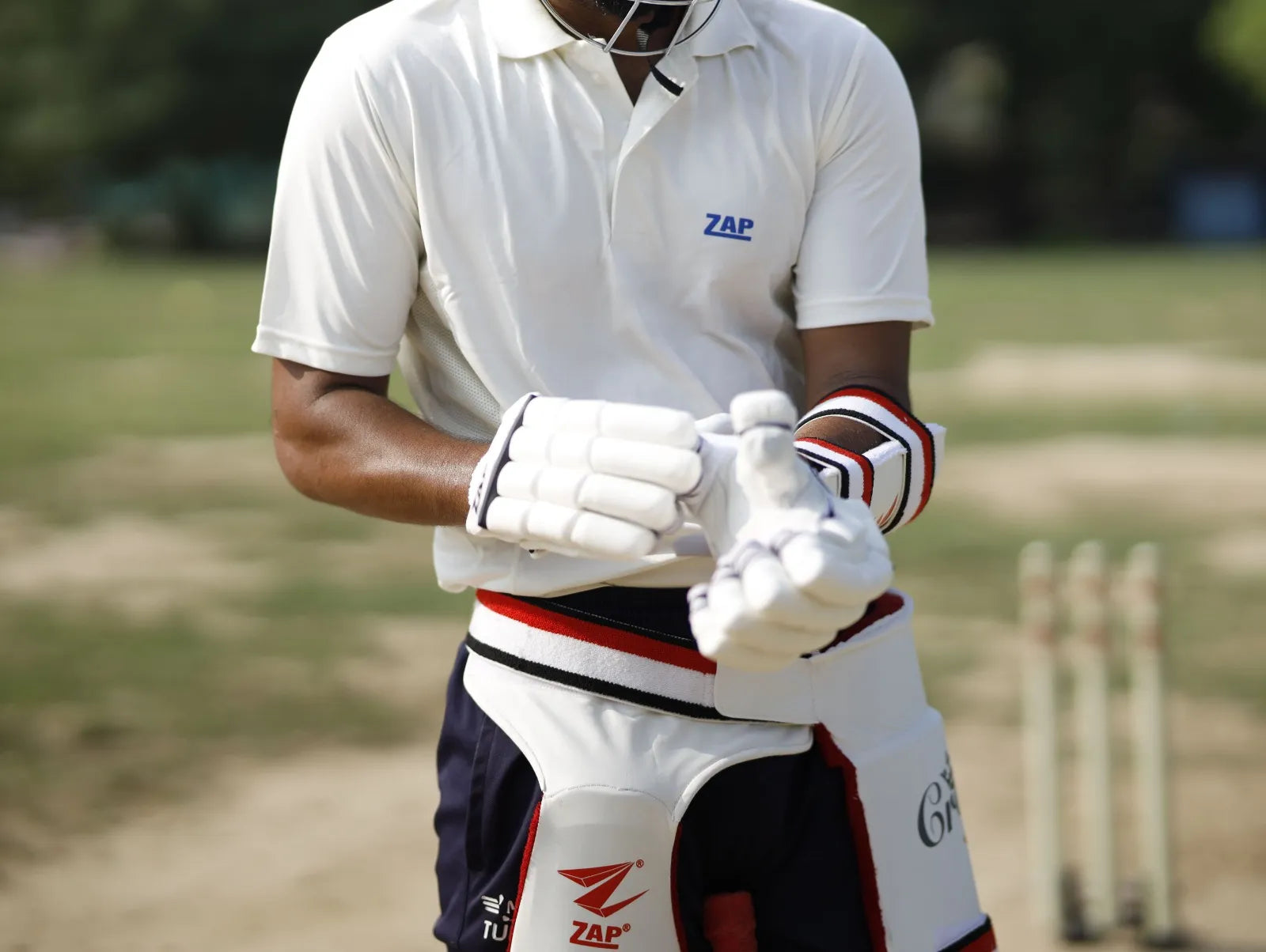 A Cricke player wearing a ZAP Cricket Batting Gloves