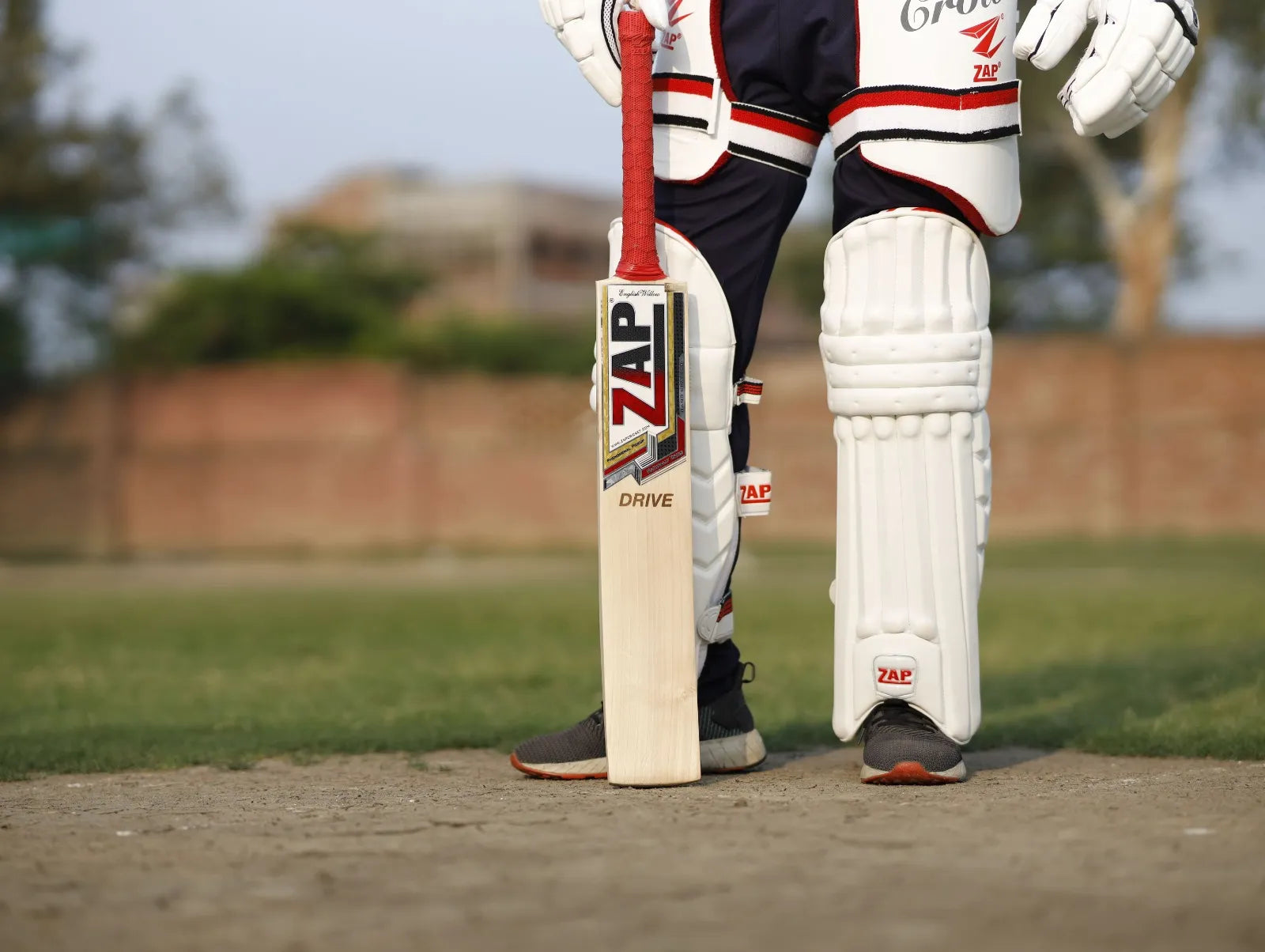 A cricket player protected with the ZAP Instinct Cricket Batting Pads