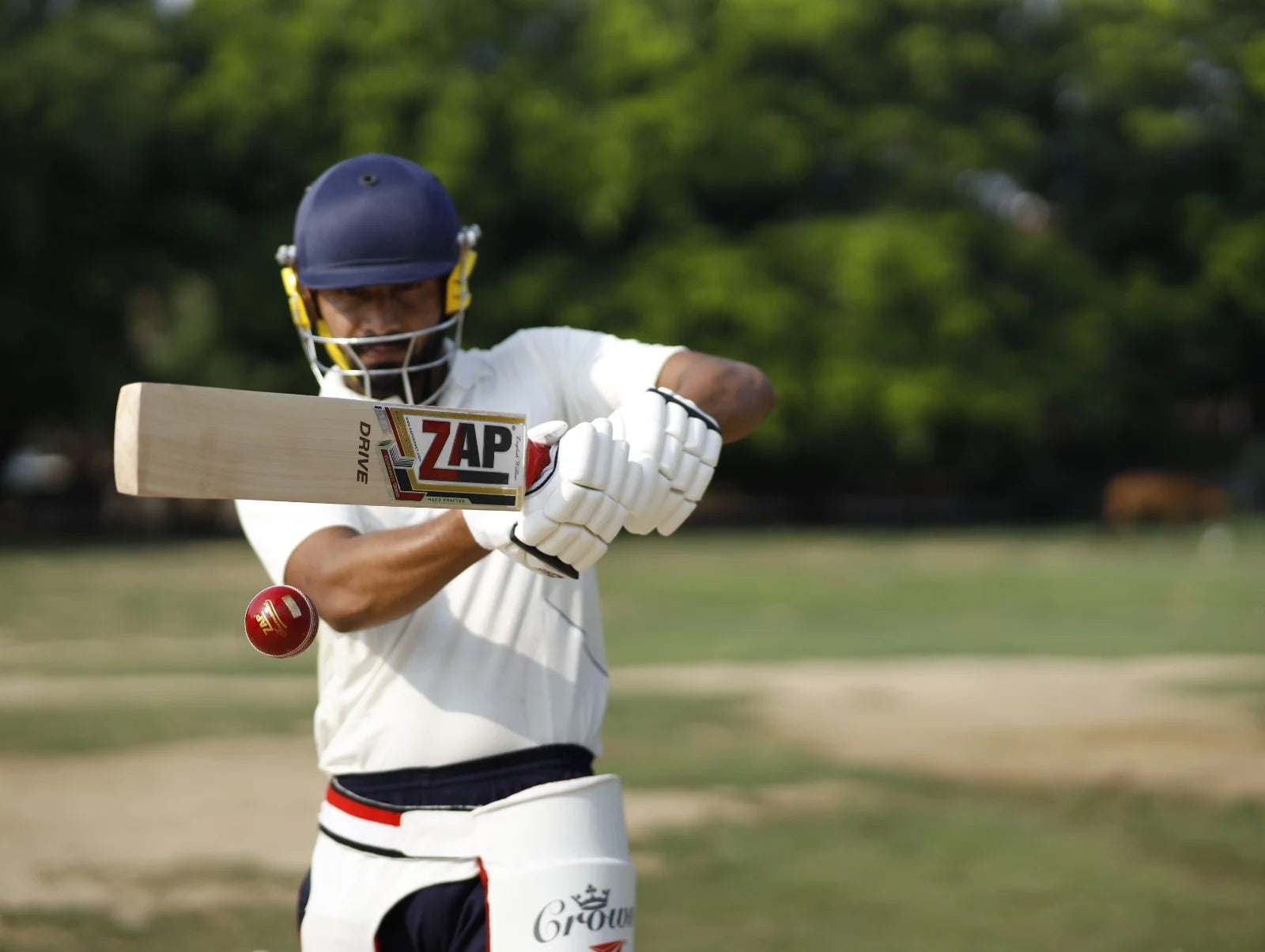 A Cricket player plays a pull shot with the ZAP Crciket Bat