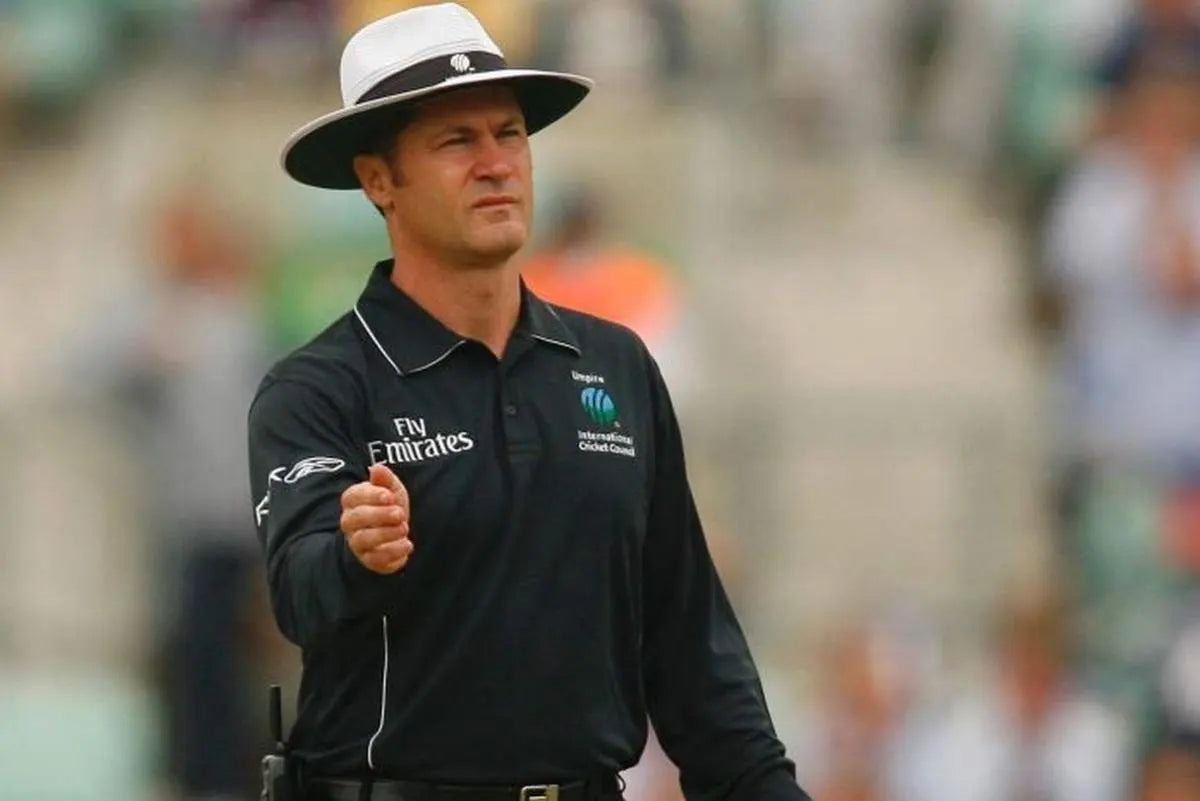 Umpire Simon Taufel signals a boundary