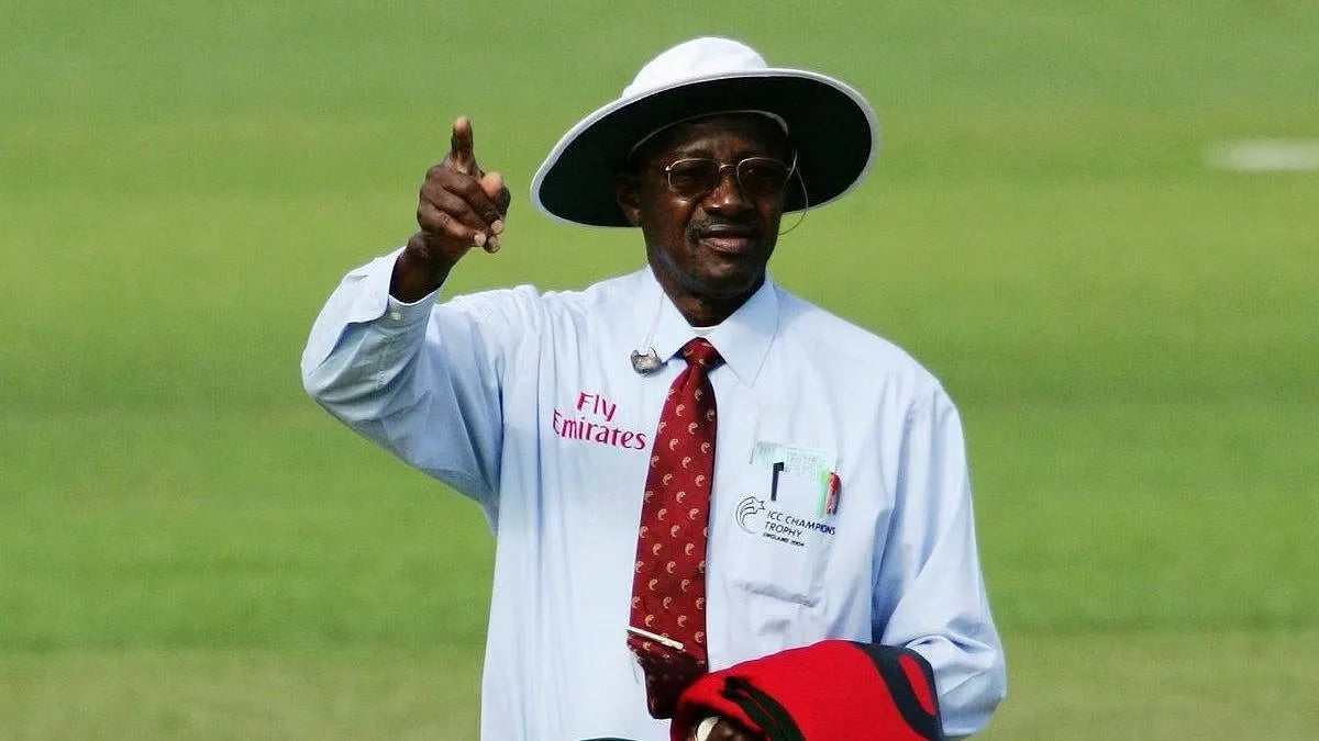 Umpire Steve Bucknor signals Out