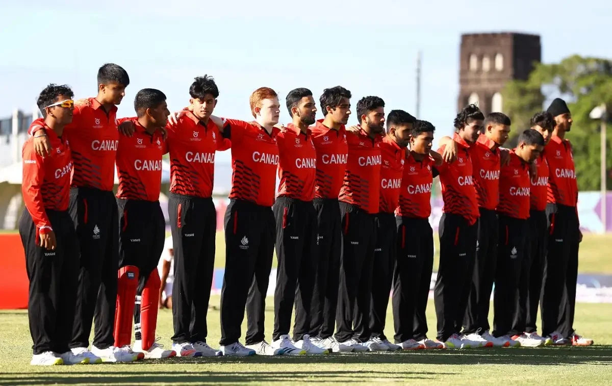 The Canadian Cricket Team Players standing for the National Anthem before a cricket match