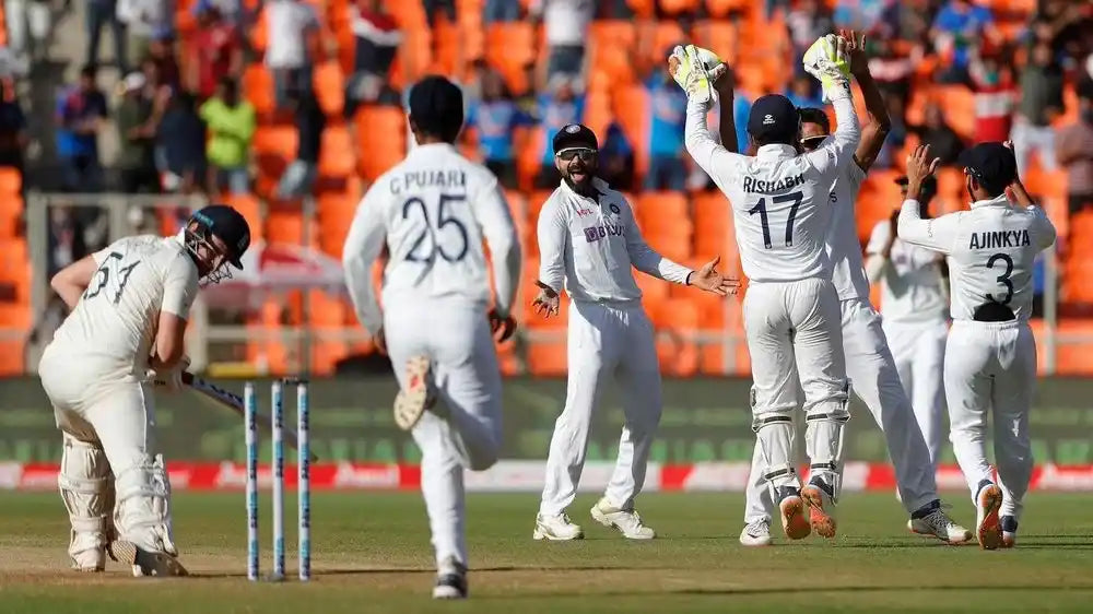 Virat Kohli and Co. celebrate a wicket in a Test Match vs England at the Narendra Modi Stadium 