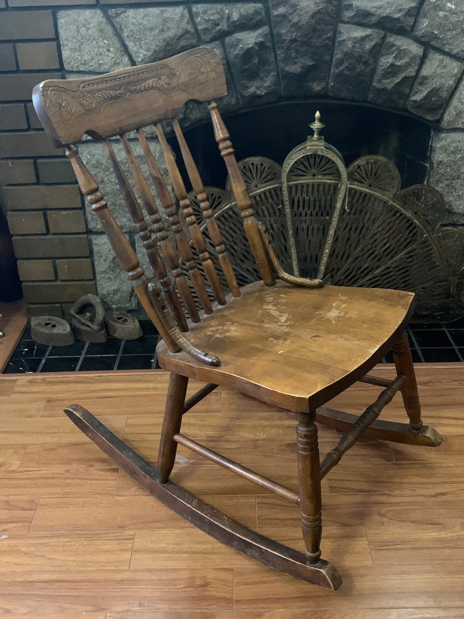 antique pressed back rocking chair