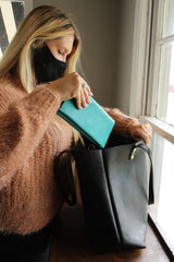 Customize your leather tote by Kerry Noël with pockets to fit your wallet!