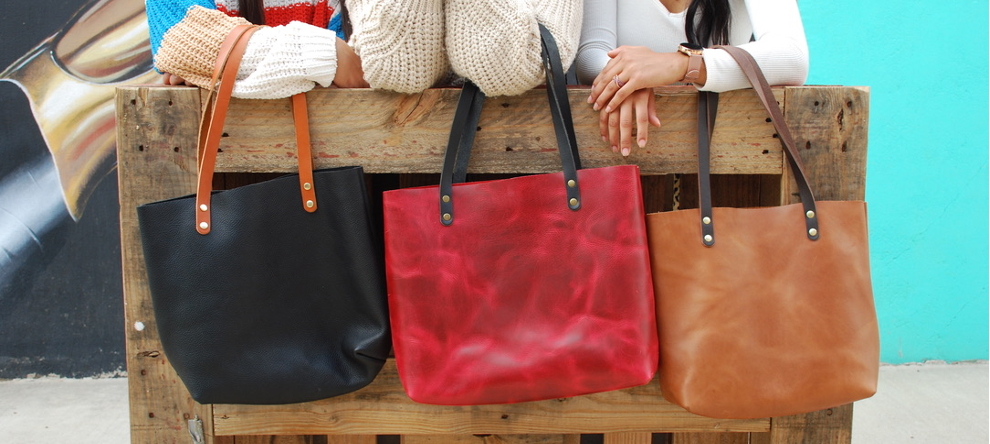 All of our genuine leather large totes come in a variety of colors including the dark brown leather tote bag, tan leather tote, and navy leather tote!