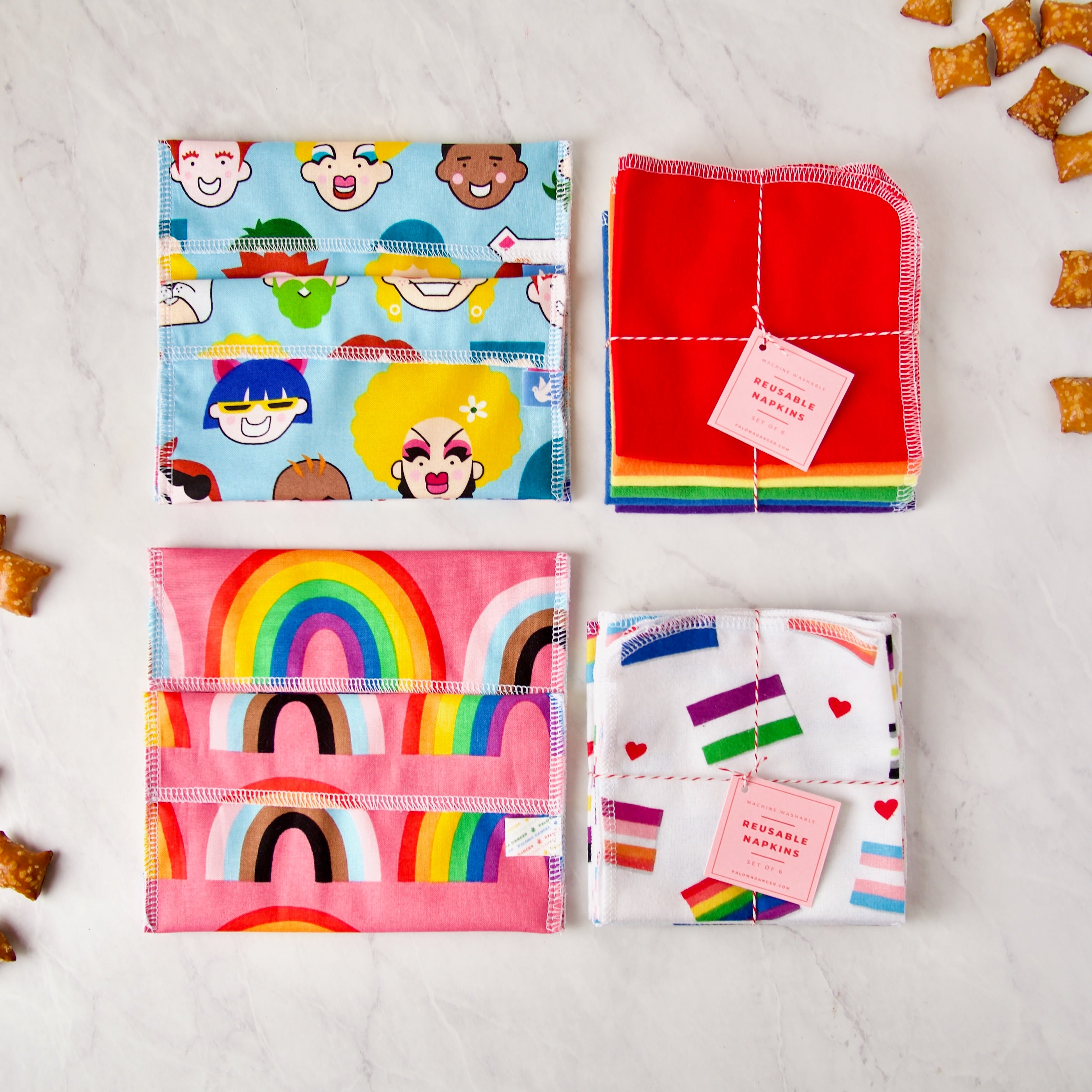 Pride Mini Collection featuring reusable snack bags and napkins in pride colors and prints