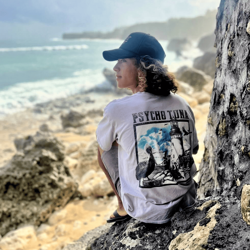 Titus Kaimana Santucci wearing Psycho Tuna graphic Tee