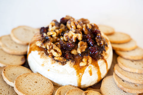 walnut and cranberry baked brie cheese board