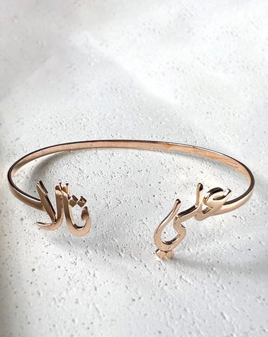Silver bracelet with two hearts and engraving