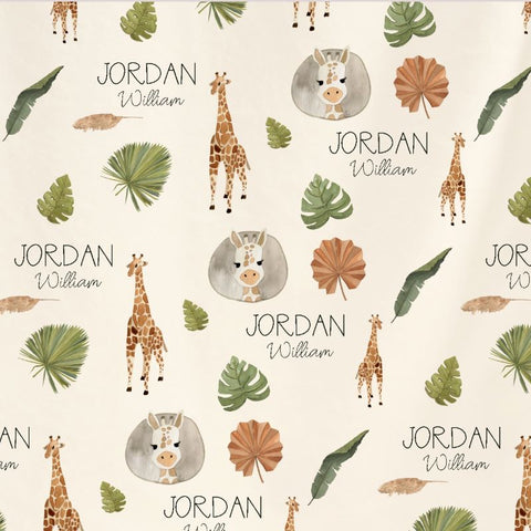Giraffe, palm leaves and custon name on a fabric sample from A Great Baby