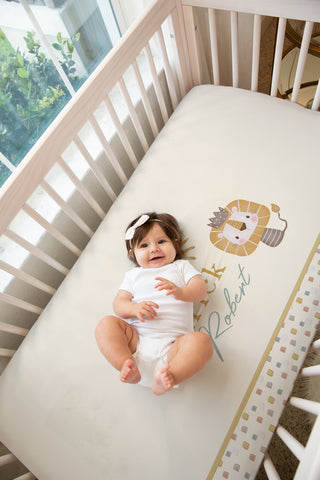 Lion Print Baby Personalized Crib sheet with a lion on it and a crown, A Great Baby