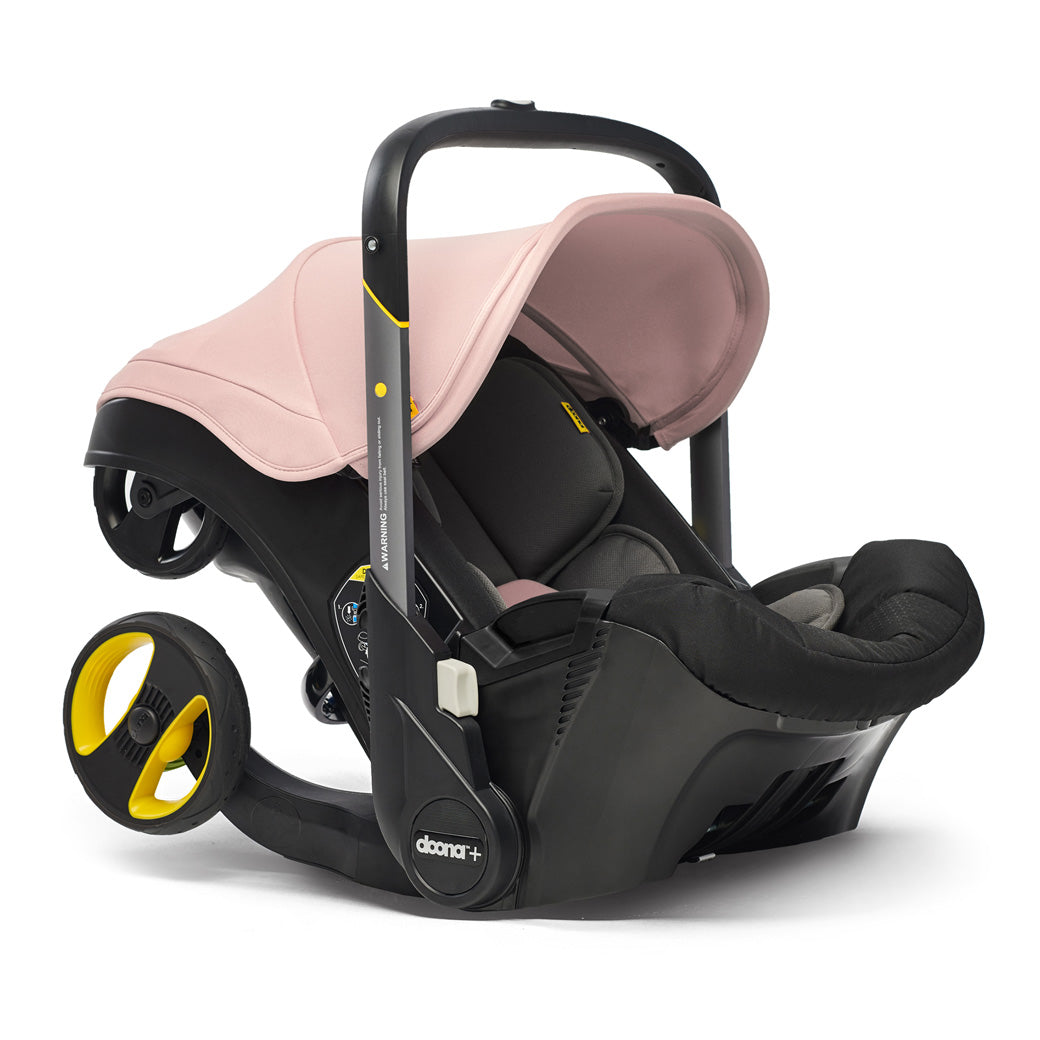 Doona Infant Car Seat and Stroller in -- Color_Blush Pin