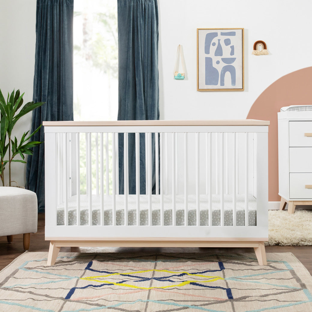 Babyletto's Scoot 3-in-1 Convertible Crib in a room in -- Color_Washed Natural/White
