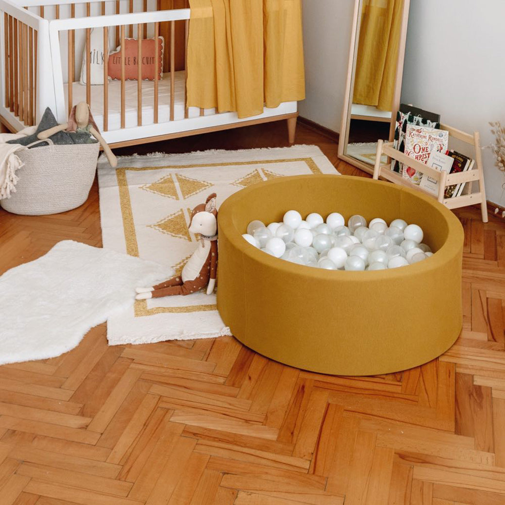 Mustard ball pit in room-- Lifestyle