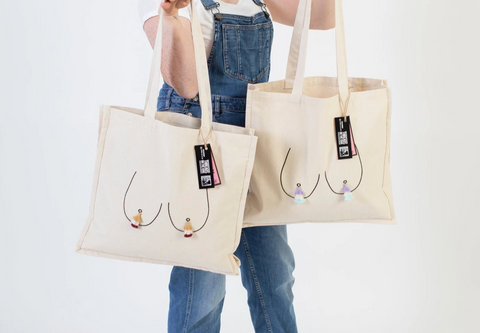 boobs with tassels tote bag