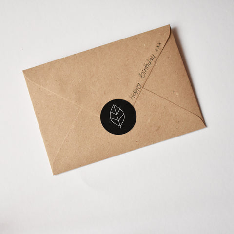 minimalist kraft envelope decoration with seal sticker elemente design