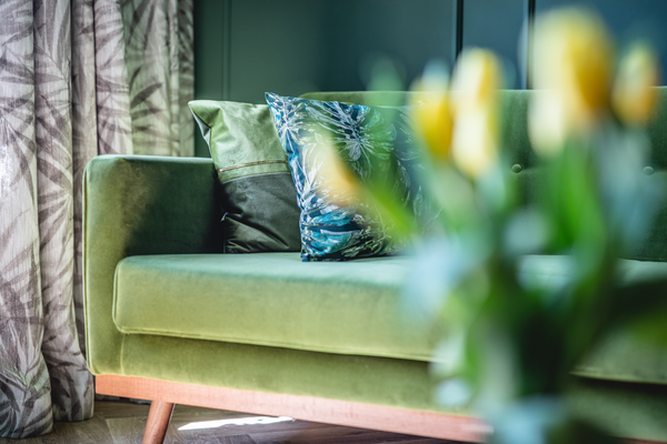 green elegant-looking sofa