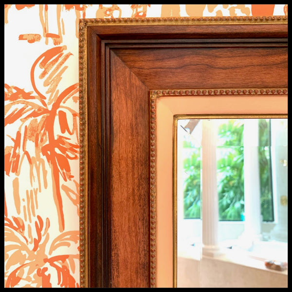 Custom frame made by hand with 22k gold leaf and walnut for mirror in Palm Beach home